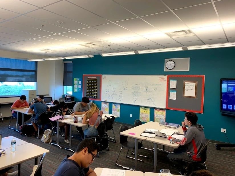 Mark Anthony Borrega teaching in a classroom